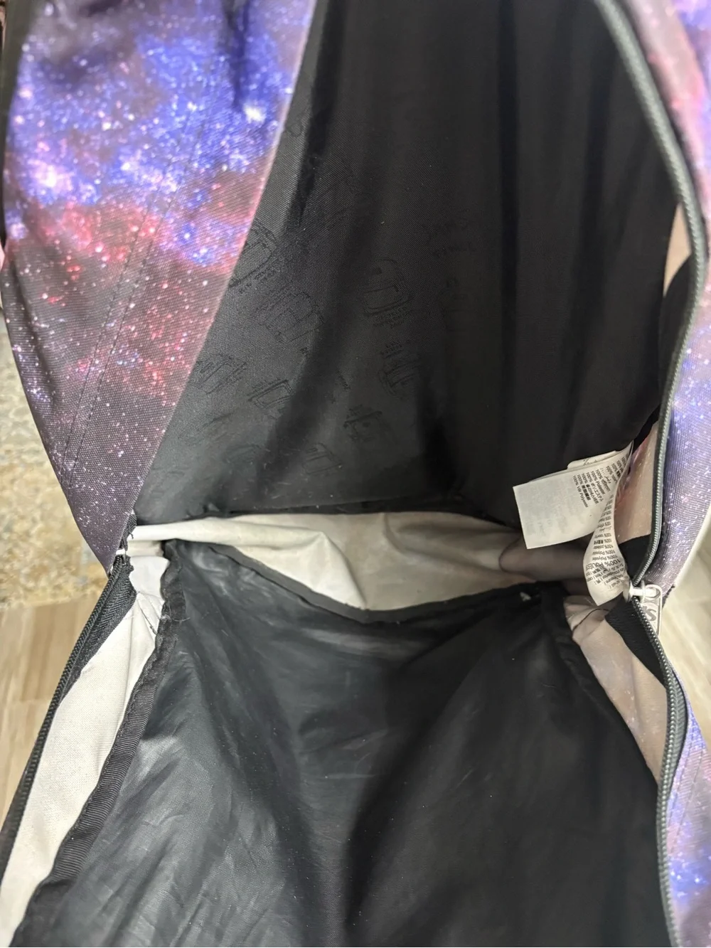 Jansport Galaxy Print Backpack in Black, Purple and Blue